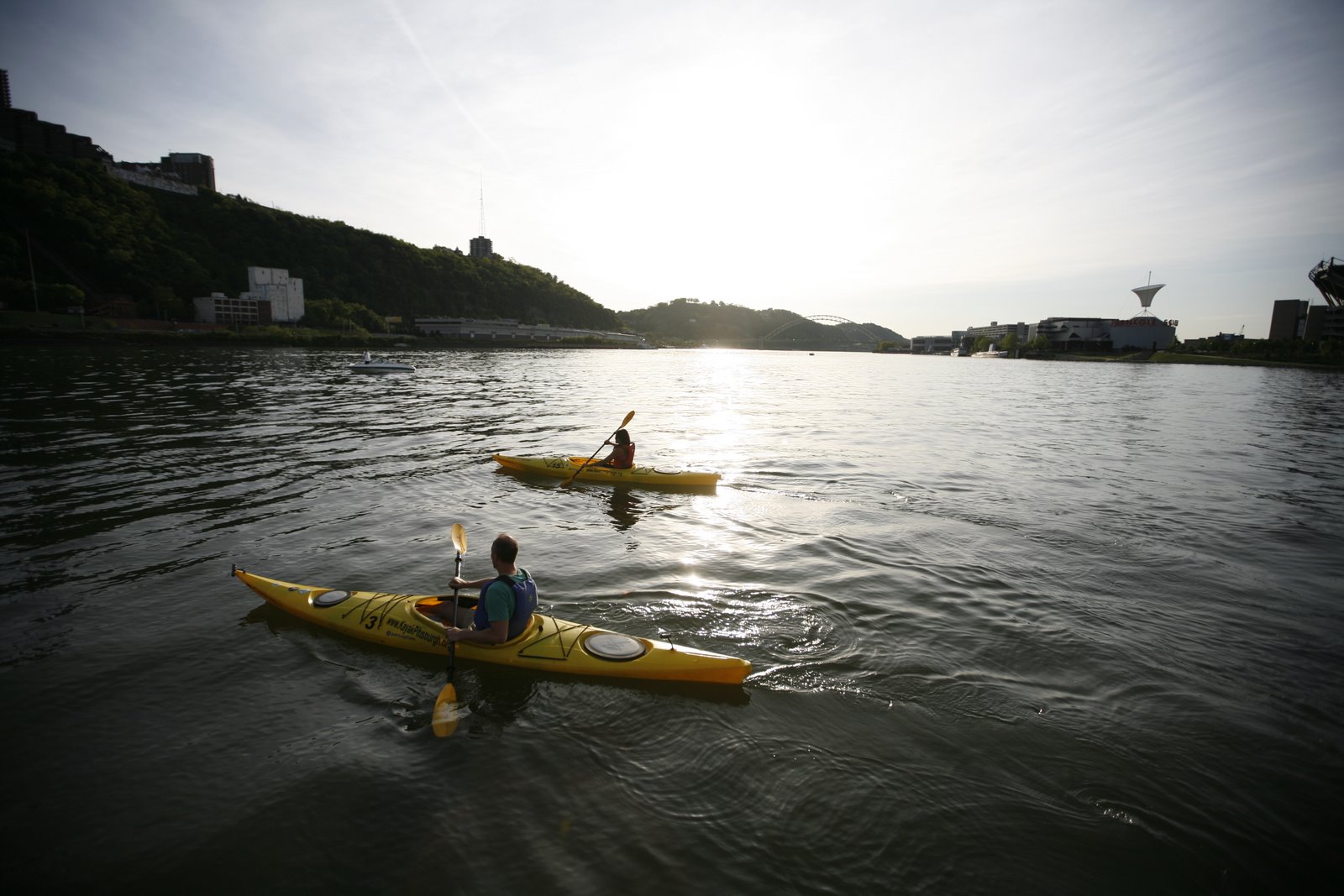 Two kayaks floating in a river