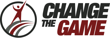 A circular logo with a graphic of a red individual standing on gray and red stripes, along with the text "Change The" in black and "Game" in red on the right, all on a white background