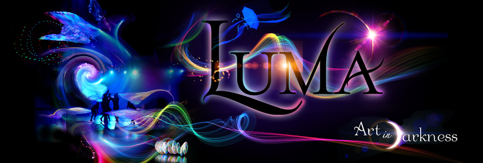 A graphic of silhouettes dancing in ambient blue lighting with multicolored lights spiraling out, along with the text "Luma" in large stylized black font, and " Art in Darkness" in white in the bottom right corner