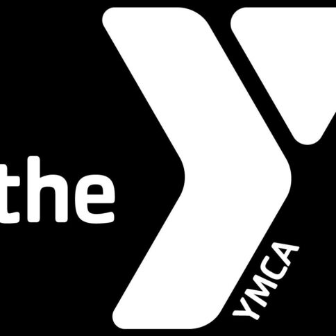 A white graphic of a letter Y, along with the text "the" in white, and "YMCA" in white, all on a black background