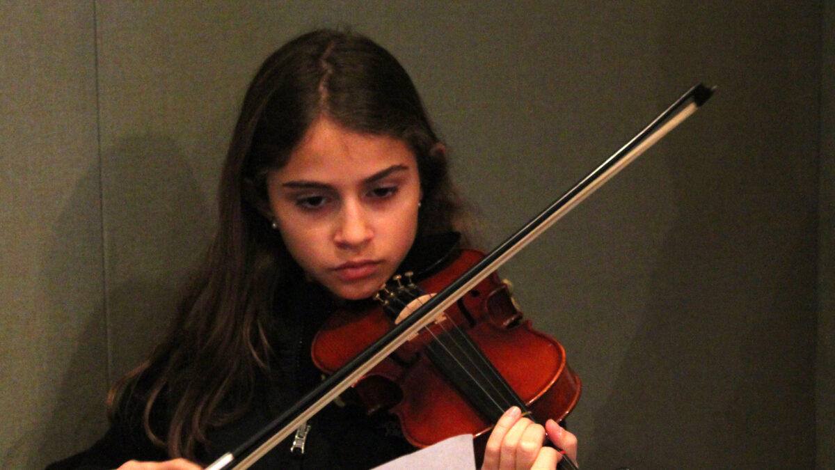 IMG_5040 A youth playing violin in a radio studio