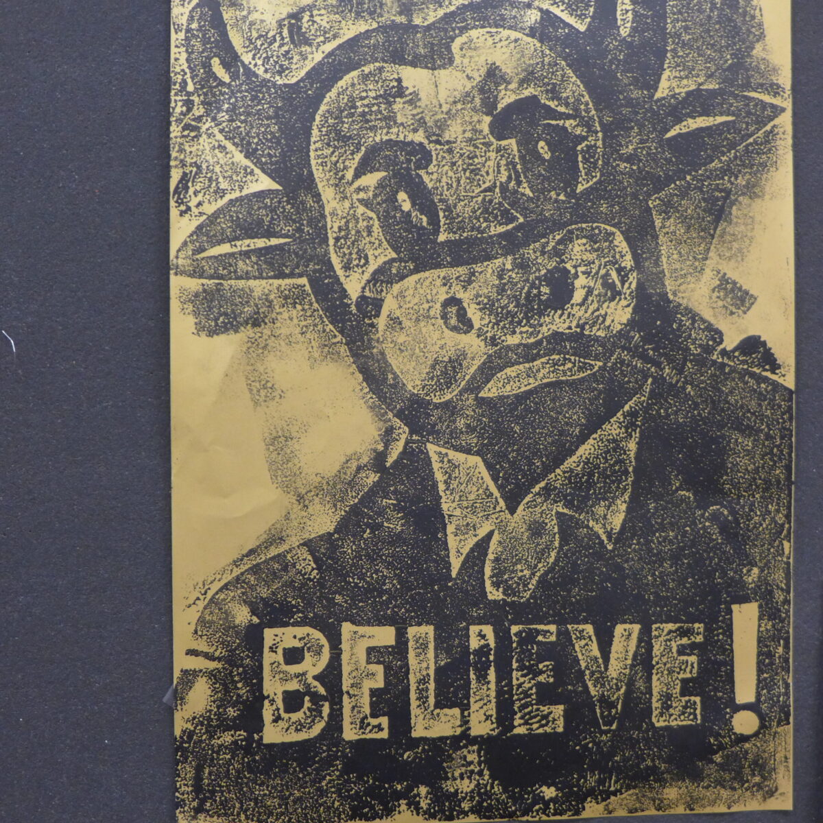 A drawing of a cow wearing a suit with the text "Believe!" underneath.
