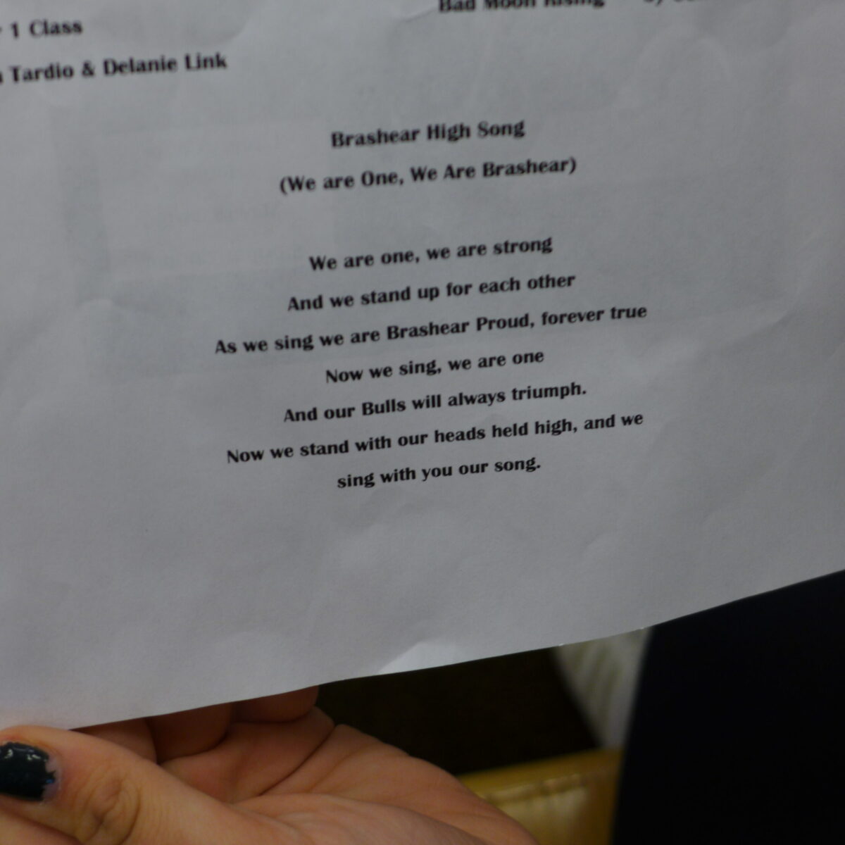 A piece of paper with the Brashear High School Song written on it