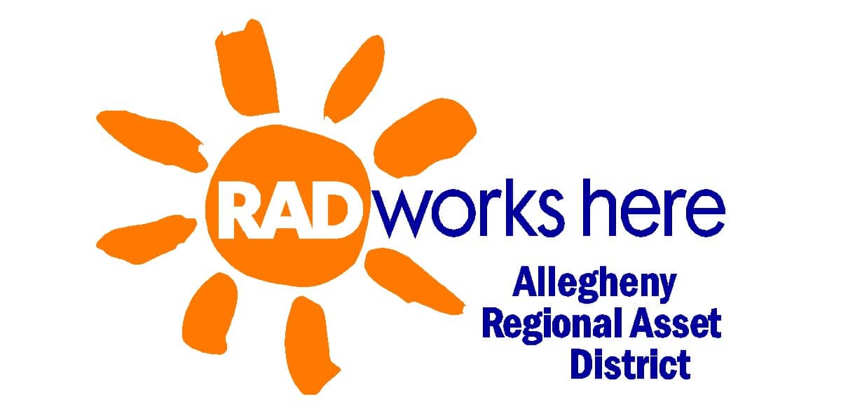 The text "RAD" in white surrounded by an orange sun and the text "works here" and "Allegheny Regional Asset District" in blue to the right written on a white background