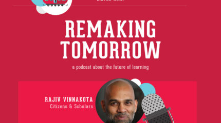 adult with glasses wearing tan sweater