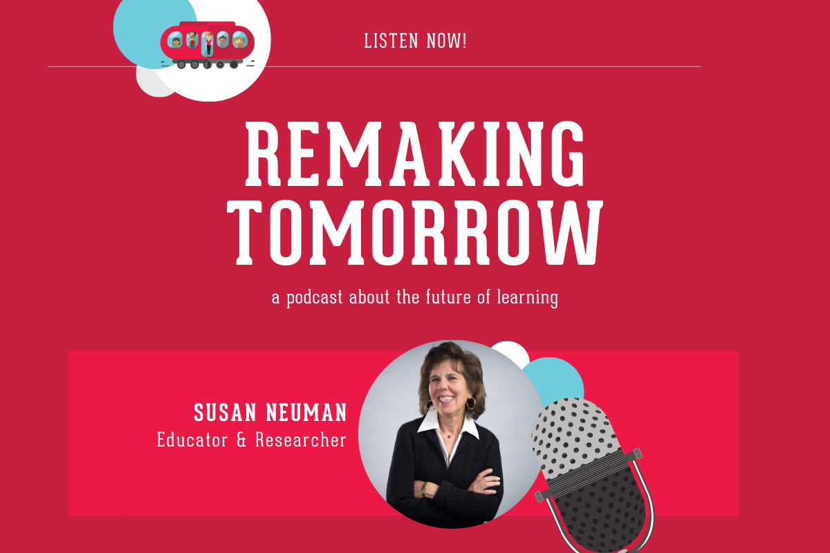 adult with hoop earrings and black jacket profiled on a gray background