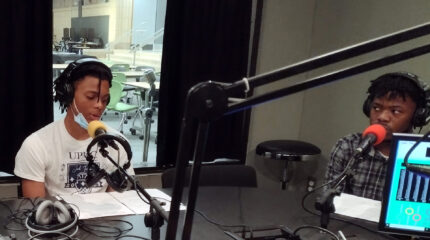 Two teens speaking in a radio studio