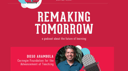 adult with blue polo standing in profile