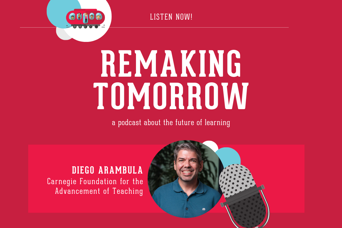 adult with blue polo standing in profile