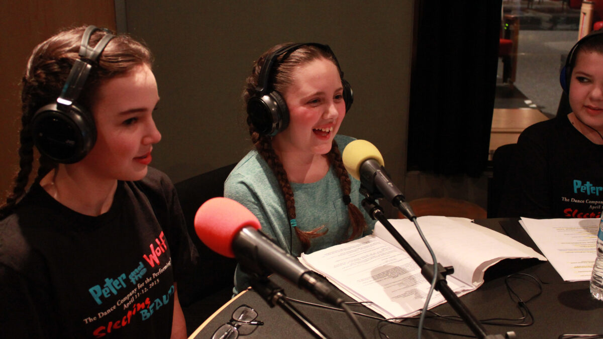 IMG_8082_wp Three youth wearing headphones speaking into microphones in a radio studio