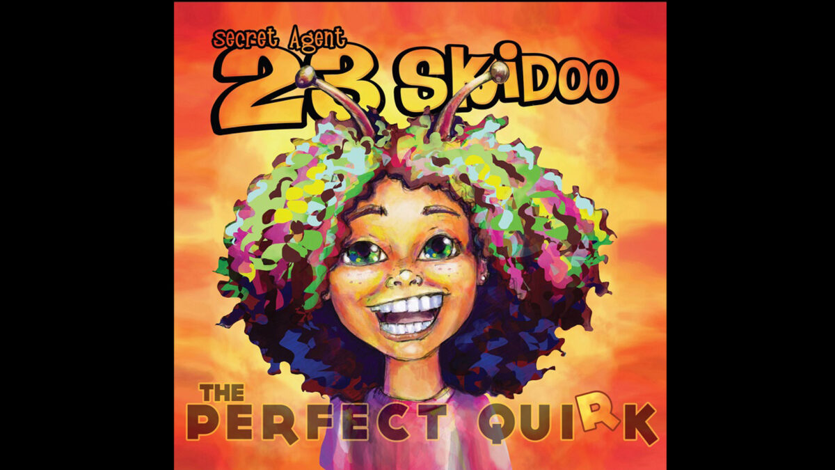 Secret-Agent-23-Album_wp A drawing of a youth with alien antennae standing in front of an orange background, along with the text "Secret Agent 23 Skidoo" on top and "The Perfect Quirk" on the bottom of the image