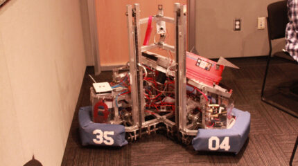 A robotic contraption in the corner of a radio studio