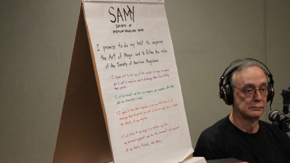 Text on a poster board describing the rules of the Society of American Magicians Youth